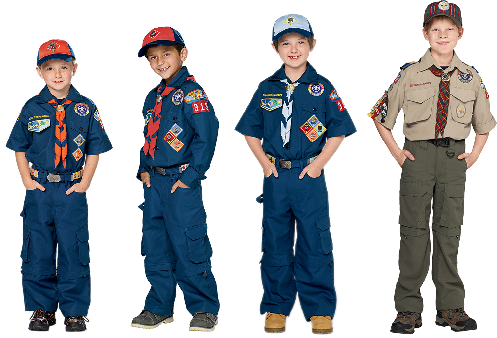 Four cub scouts dressed in field (Class A) uniforms.  From left to right, Tiger (orange), Wolf (red), Bear (blue), and Webelos (tartan).